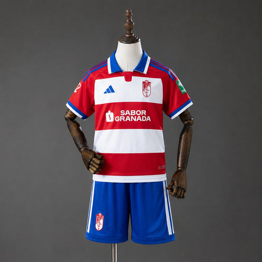 26-27 Granada primera equipación niño