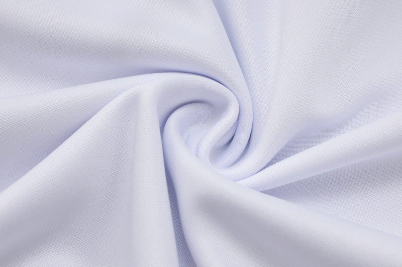 25-26 Real Madrid conjunto de chándal niño blanco/morado