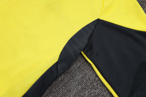 25-26 Real Madrid conjunto de chándal amarillo/negro niño