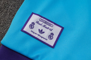 25-26 Real Madrid conjunto de chándal niño azul/morado