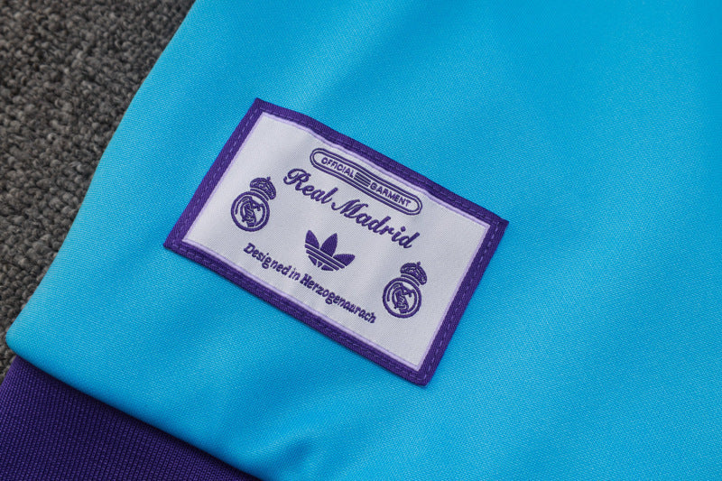 25-26 Real Madrid conjunto de chándal niño azul/morado