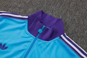 25-26 Real Madrid conjunto de chándal niño azul/morado