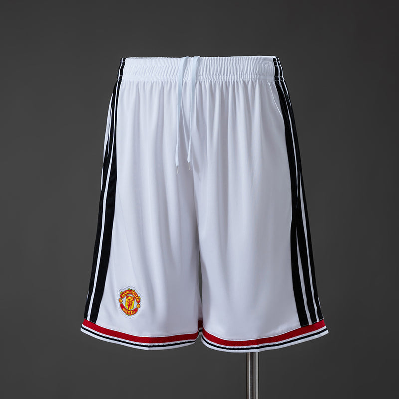 26-27 Manchester United pantalones primera equipación