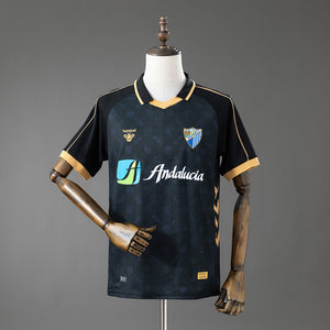 25-26 Málaga primera equipación jornada retro negra