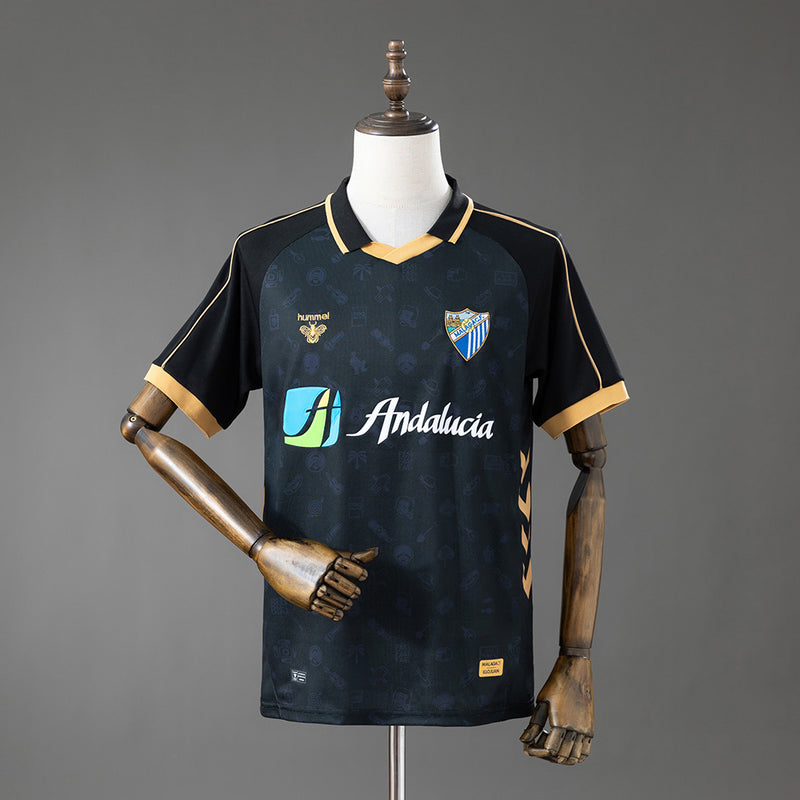 25-26 Málaga primera equipación jornada retro negra