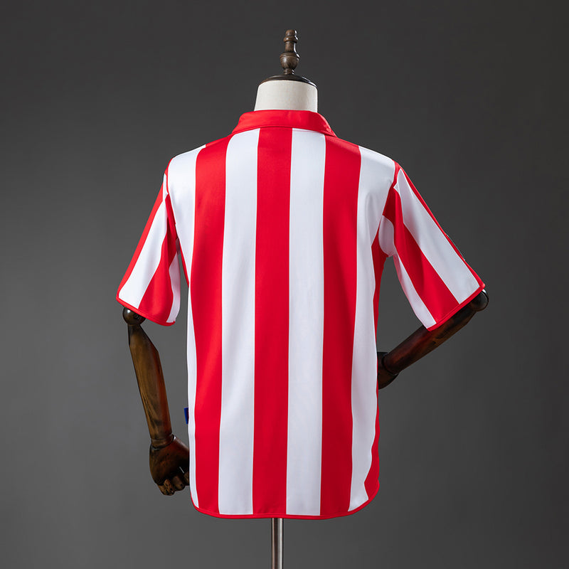 03-04 Chivas primera equipación