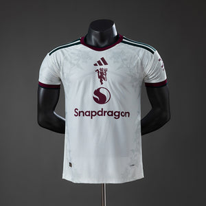 26-27 Manchester United tercera equipación