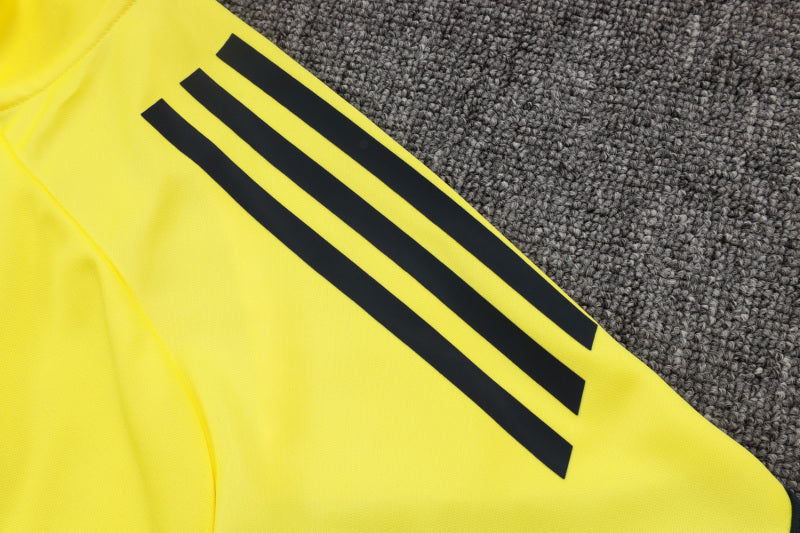 25-26 Real Madrid conjunto de chándal amarillo/negro niño