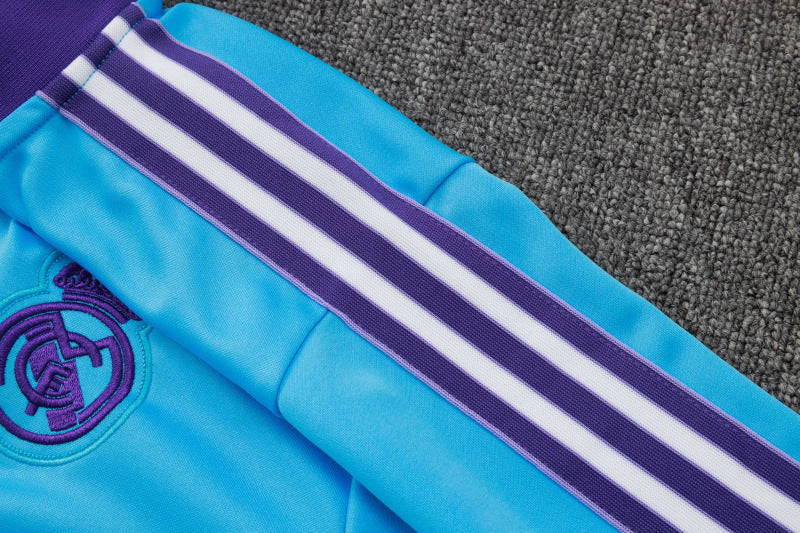 25-26 Real Madrid conjunto de chándal niño azul/morado
